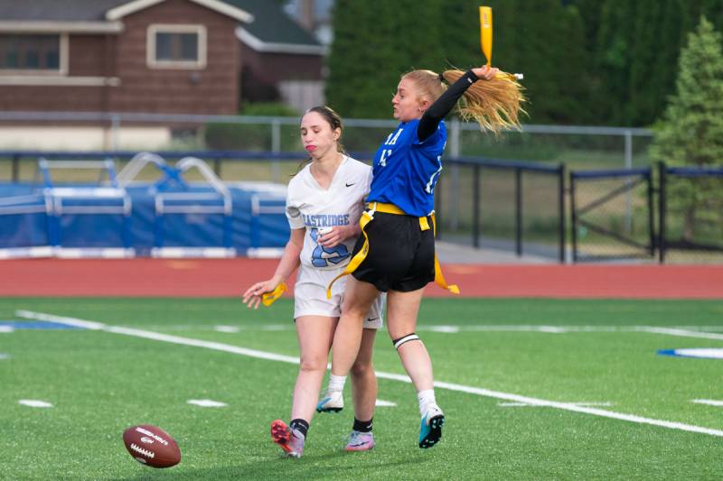 Senior Alyssa Tallone gets an Eastrige flag pull behind the line of scrimmage for a loss of yards