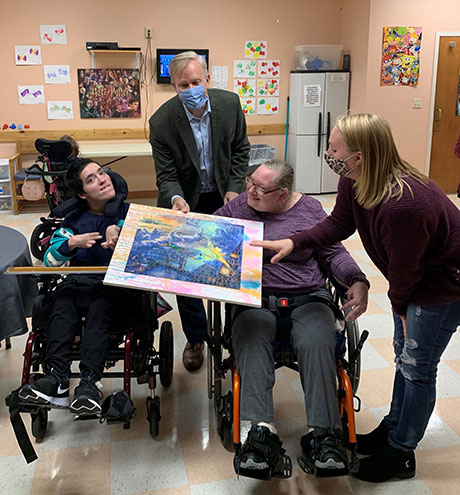 3._alicia_kathy_and_day_hab_specialist_kristen_ace_with_congressman_chris_jacobs._alica_and_kathy_presented_him_with_puzzle_art.jpg