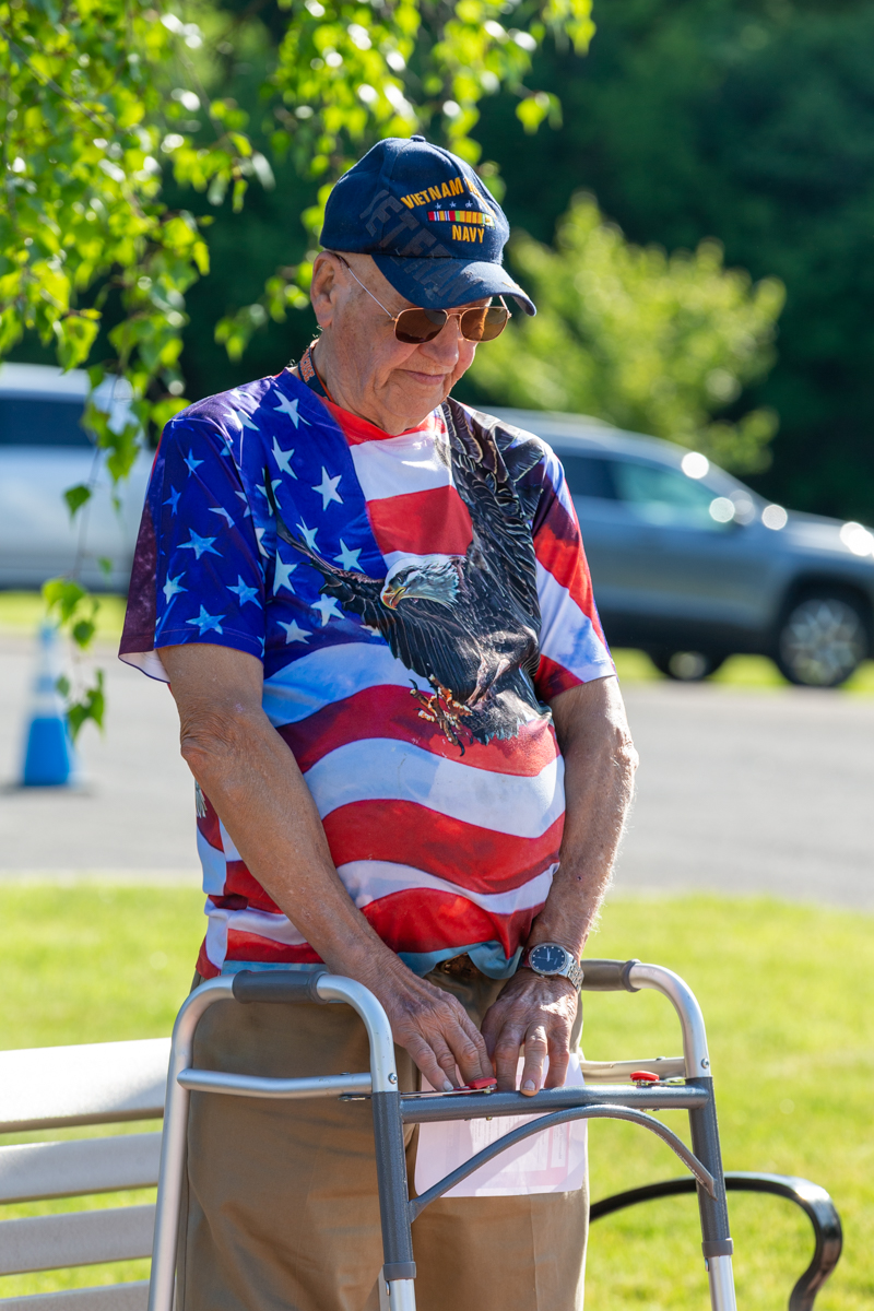 A veteran bowing in prayer during the memorial day ceremony
