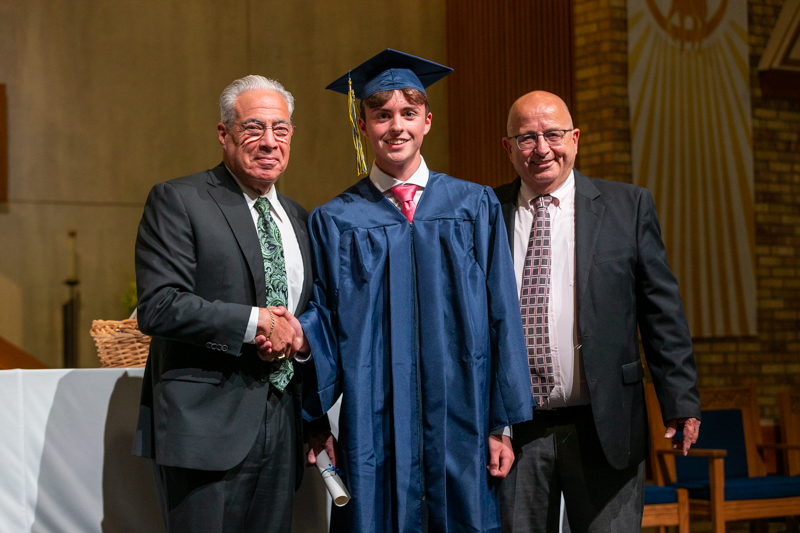 Senior Gino Faletti receiving his diploma