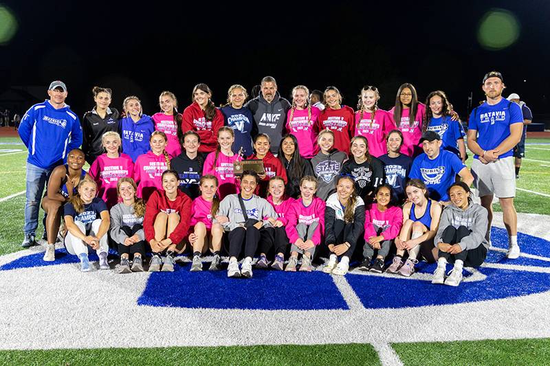 Gilrs track team with coaches celebration section V team photo