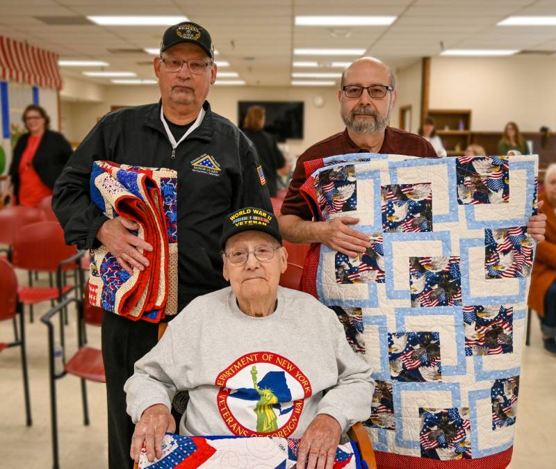 veterans with quilts