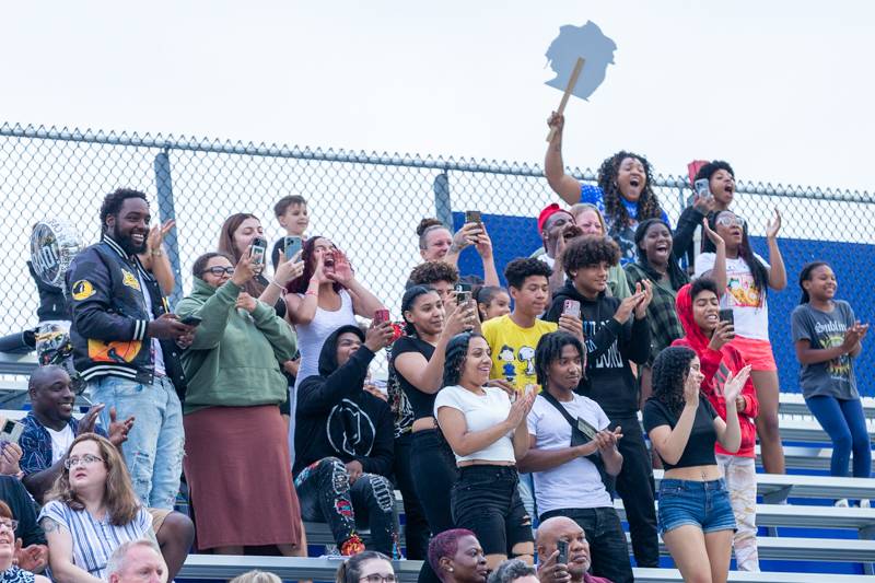 Jevon Griffins family cheering him in the moment of him receiving his diploma