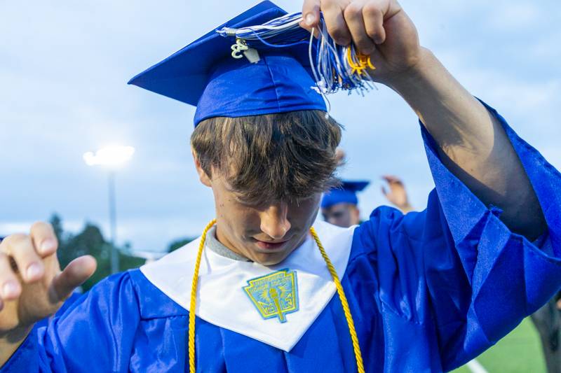 Senior Aidan A. Anderson turns his tassle right to left commencing him and the Class of 2023 officially graduated