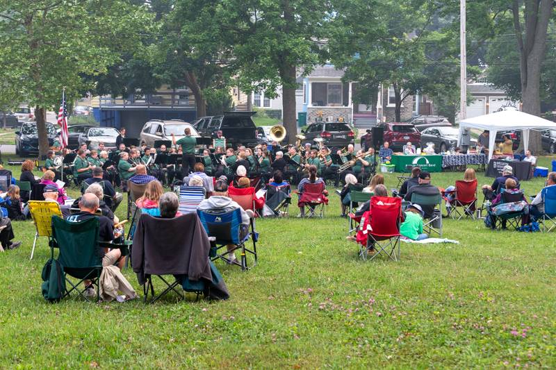 Batavia Concert Band music followers enjoy a wednesday evening in centennial park.  Photo by Steve Ognibene