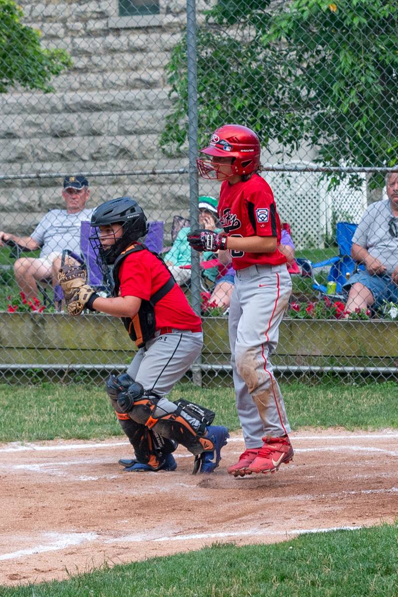 Bolivar-Richburg allows another LeRoy run at home plate.  Photo by Steve Ognibene