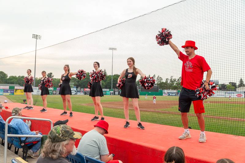 KMS Diamond Dance Team and Johnny Dog entertaining the crowd between innings. Photo by Steve Ognibene
