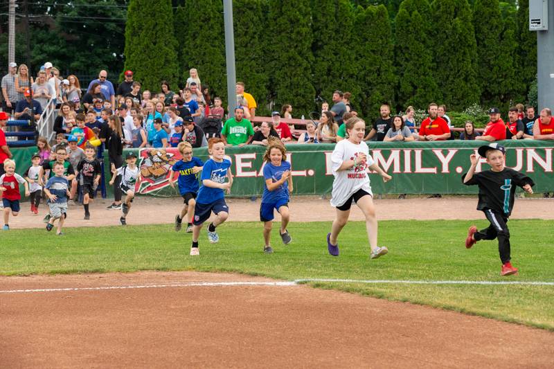 Kids running the bases.  Photo by Steve Ognibene