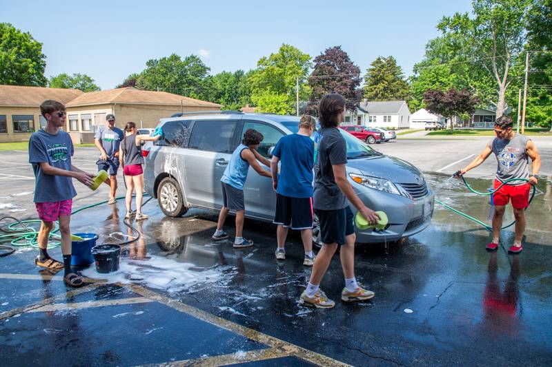 Members of BND Hockey team fundraiser today behind Notre-Dame High School until 2 p.m.