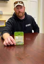Chris Van Duden with package of illegal cannabis