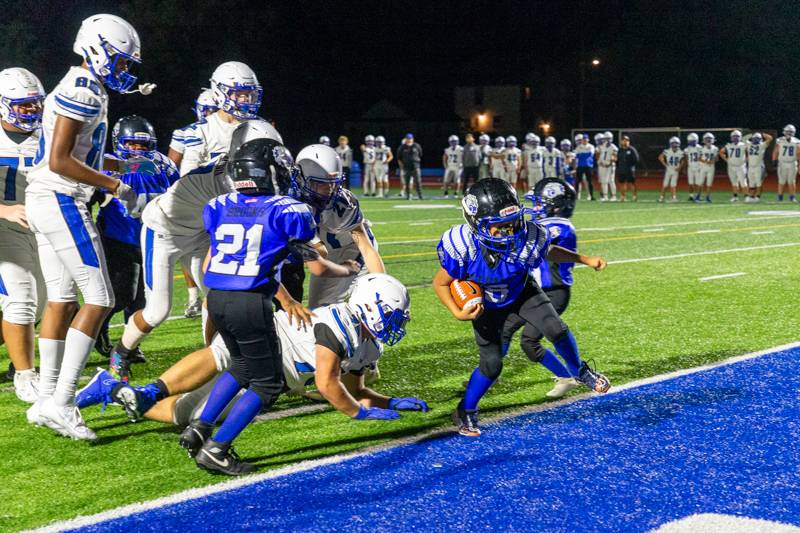 Max Monroe scores 4.7 seconds left in second half to win the game for Bulldawgs.  Photo by Steve Ognibene