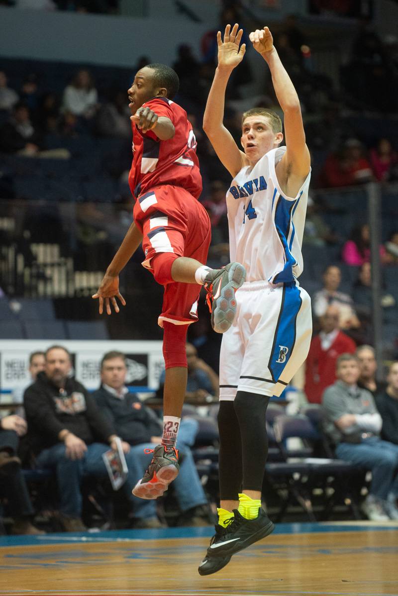 Trevor Sherwood playing basketball for the Batavia Blue Devils in 2015. Photo by Howard Owens.