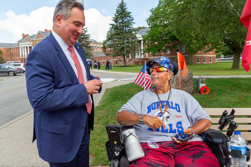 NYS Senator George Borrello speaks to US Army Veteran John McCune at 9/11 rememberance service, VA hospital Batavia  Photo by Steve Ognibene