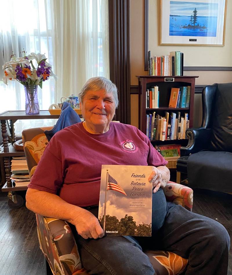 Barb Toal with her book