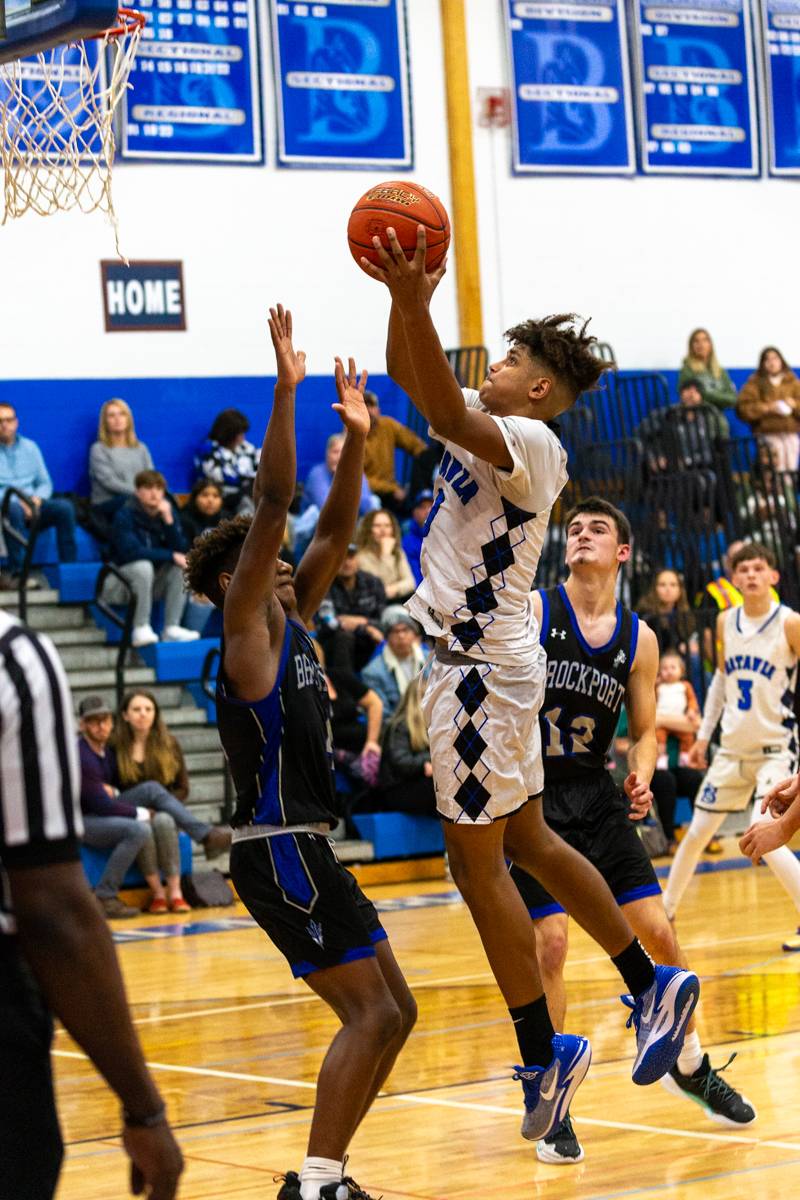 Batavia's Justin Smith driving to the net for Batavia. Photo by Steve Ognibene