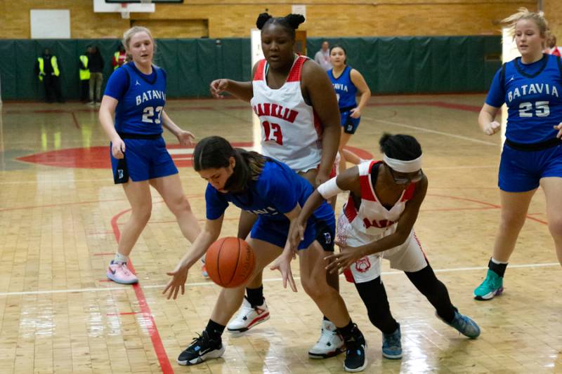 Erika Gibbs grabbing a loose ball.  Photo by Steve Ognibene