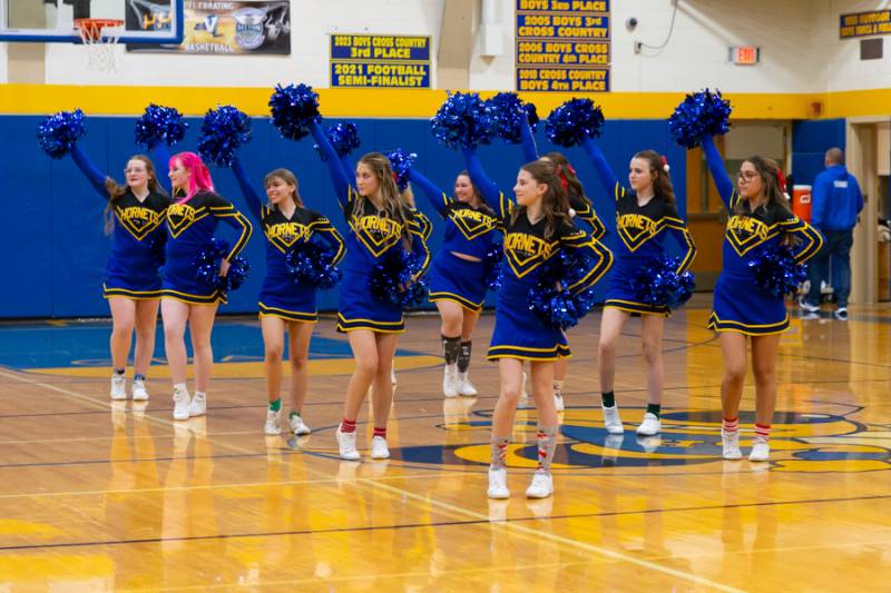 Hornets Varsity Cheerleaders halftime show center court.  Photo by Steve Ognibene