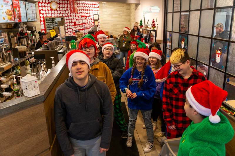 Caroling at Tim Hortons. Photo by Steve Ognibene