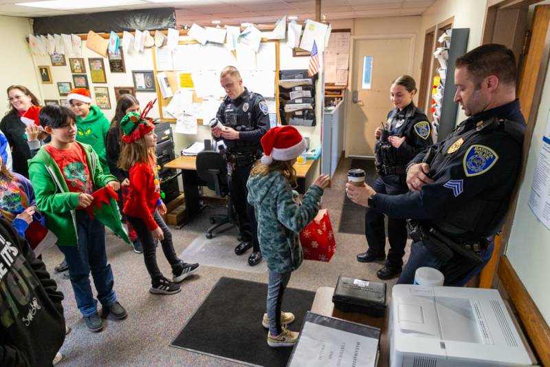 Batavia Police department welcomed students who brought gifts. Photo by Steve Ognibene