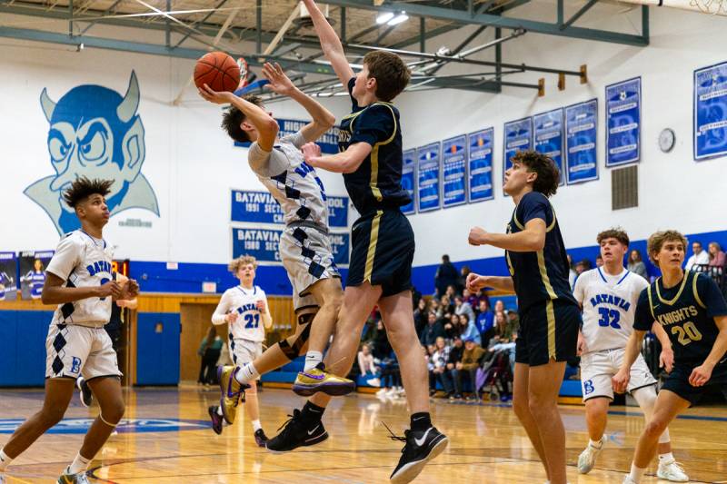 Carter Mullen driving towards the hoop.  Photo by Steve Ognibene