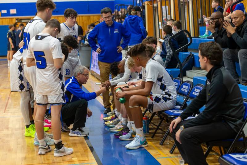 Batavia's bench calls timeout, in third quarter.  Photo by Steve Ognibene