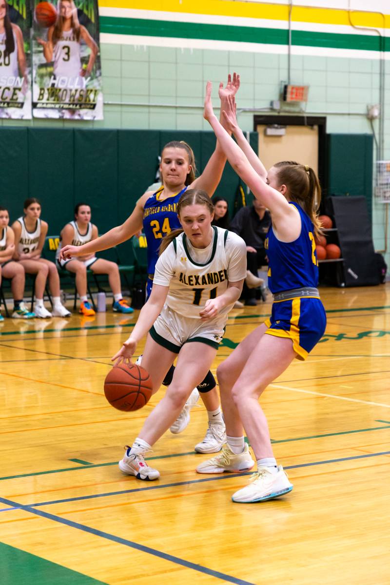 Emily Pietrzykowski driving to the hoop.  Photo by Steve Ognibene