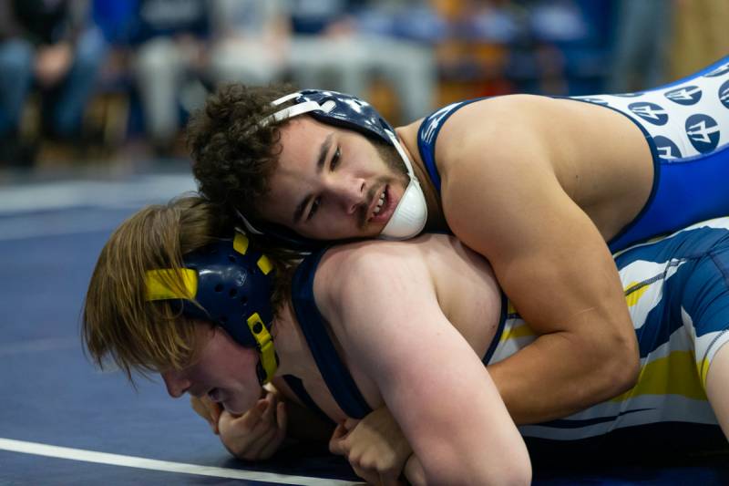 Tymothey Murrel taking his opponent down.  Photo by Steve Ognibene