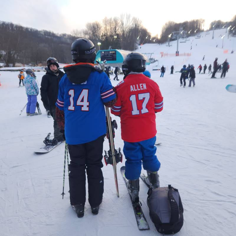 Boy Scouts at holiday valley with kid facing front