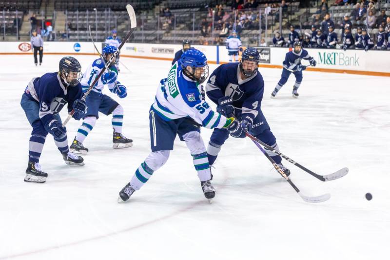 Joe DiRisio taking a shot on net.  DiRisio scored the game winning goal in overtime.  Photo by Steve Ognibene