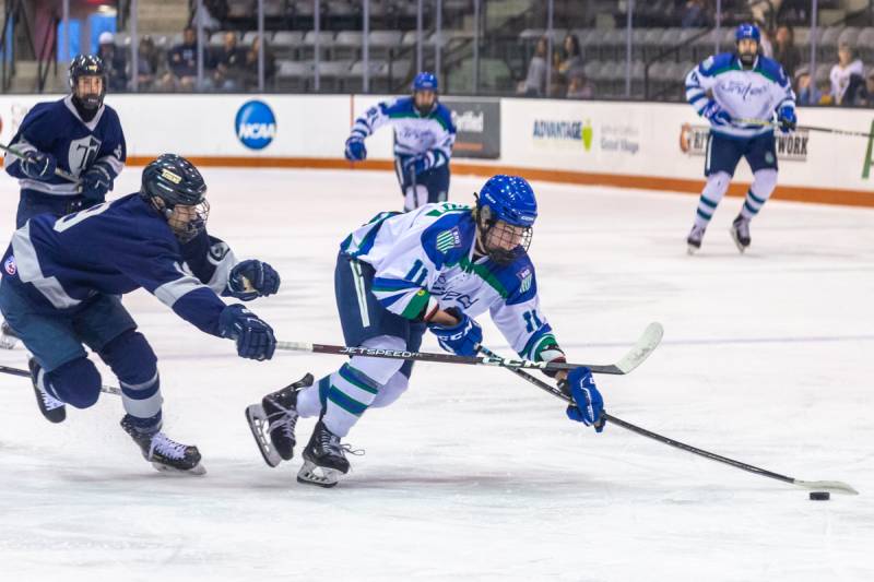 Ivan Milovidov escaping a forecheck going toward the goalkeeper.  Photo by Steve Ognibene