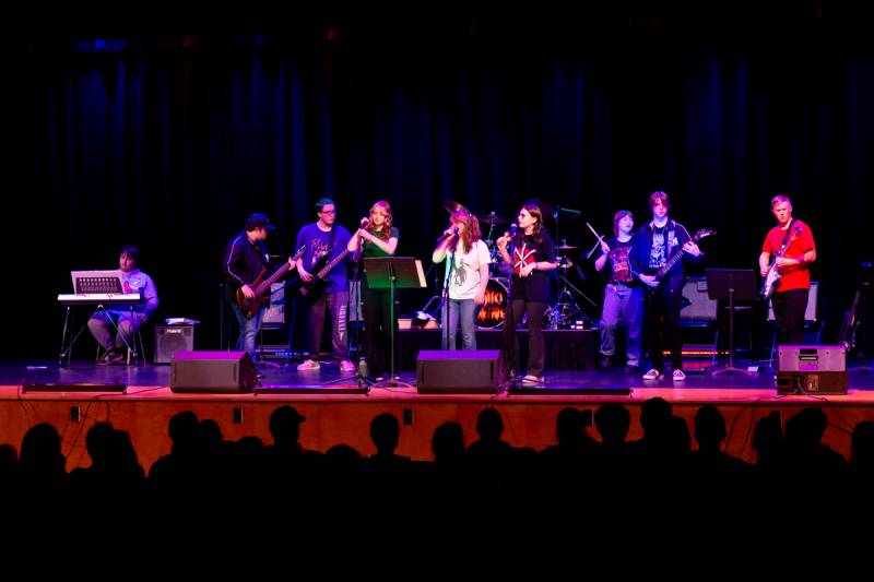 Some members of first block rock band, jam out tunes for parents and families.  Photo by Steve Ognibene