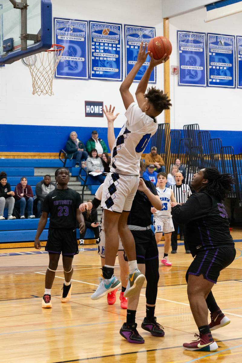 Justin Smith shooting from the paint, Smith had 24 points in the win over Odyssey.  Photo by Steve Ognibene