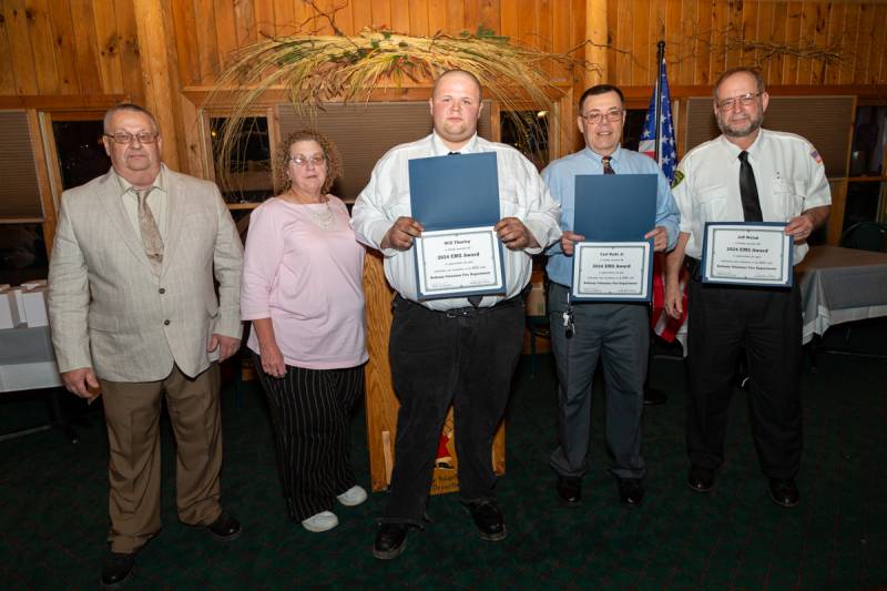 Left to right Jeff Fluker and Vicki Wolak presented EMS Awards to Will Thurley, Carl Hyde Jr, Jeff Fluker and Brian Britton (not pictured)  Photo by Steve Ognibene