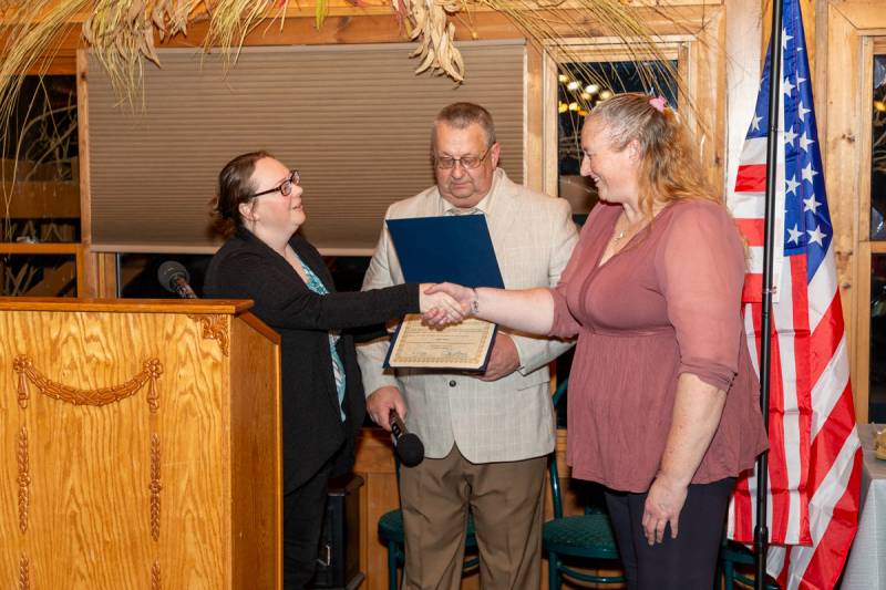 Left to right, Jayleen Carney from Steve Hawley's office and Jeff Fluker presented Peggy Johnson for her twenty years of service pin & recognition certificate.  Photo by Steve Ognibene