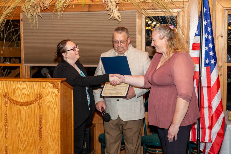 Left to right, Jayleen Carney from Steve Hawley's office and Jeff Fluker presented Peggy Johnson for her twenty years of service pin & recognition certificate.  Photo by Steve Ognibene