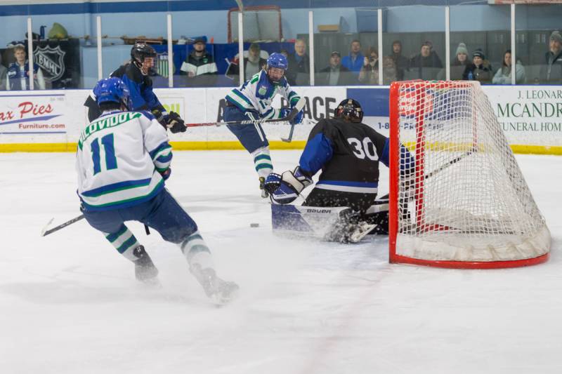 Ivan Milovidov receives a pass from Jameson Motyka for a goal in the second period.  Photo by Steve Ognibene