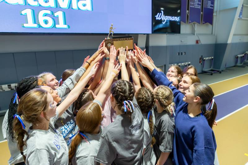 Batavia Girls celebrate their teams 18th sectional indoor track title over the last 22 years.  Photo by Steve Ognibene
