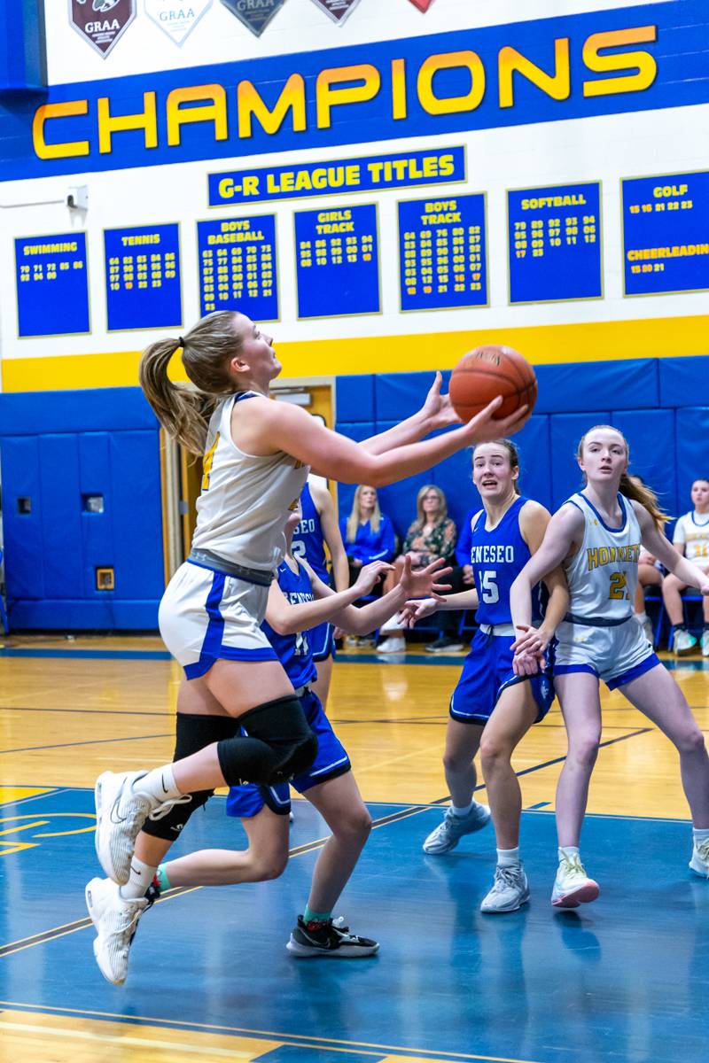 Caitlin Ryan going to the hoop, Ryan scored 20 points in the Hornets win.  Photo by Steve Ognibene