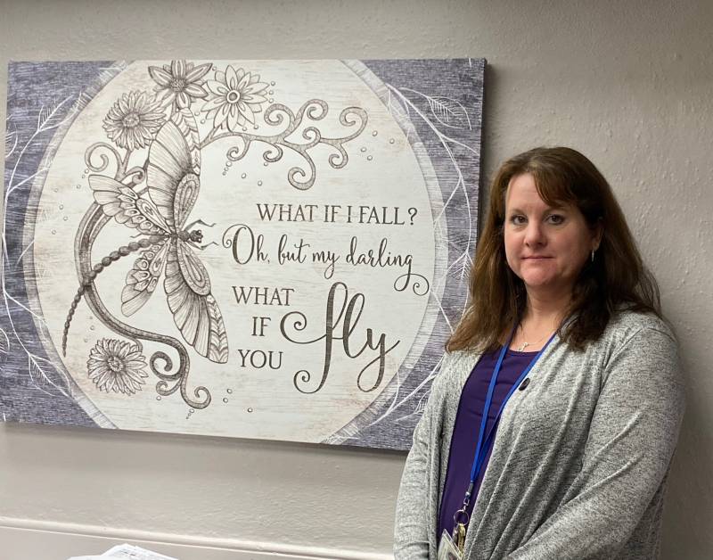 Tammi Ferringer with wall art 