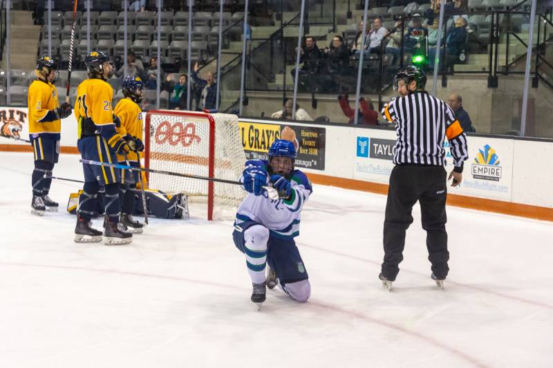 Jameson Motyka scores a goal in the second period.  Motyka added two more goals go get the hat-trick including the game winner in overtime.  Photo by Steve Ognibene