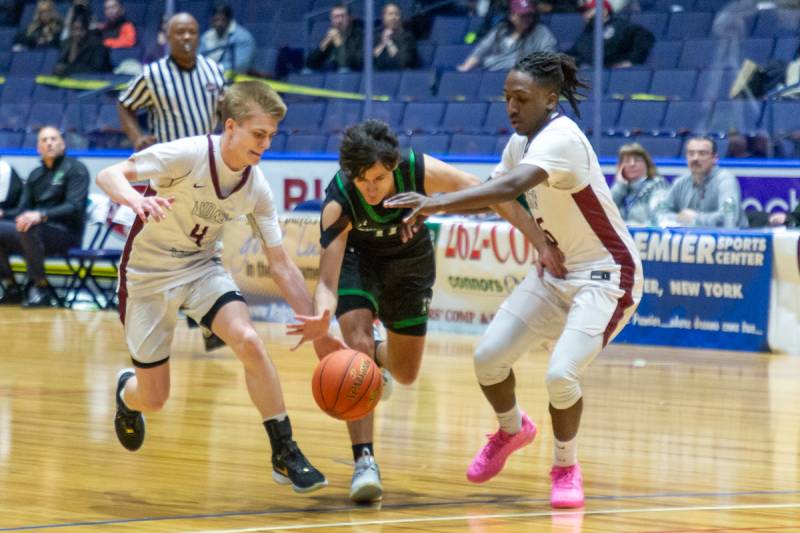 Avery Ferreira going up court.  Photo by Steve Ognibene