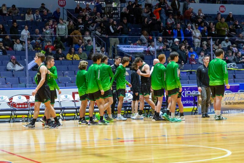 Pembroke players consult with each other post game.  Photo by Steve Ognibene