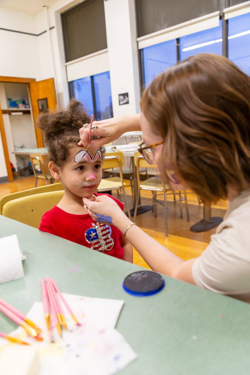 Many families packed the City Church recreational center Tuesday evening for an evening of fun for all ages.  Photo by Steve Ognibene 