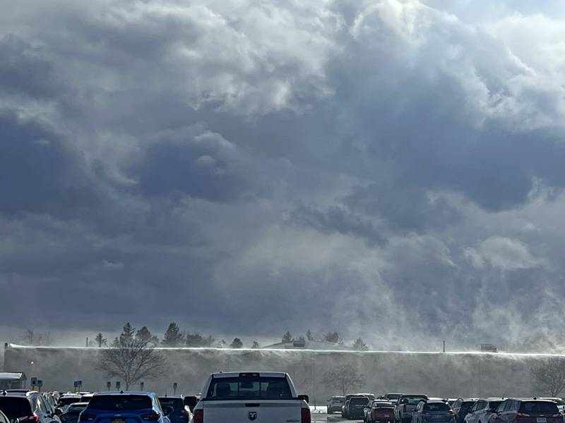 snow blowing off kmart building