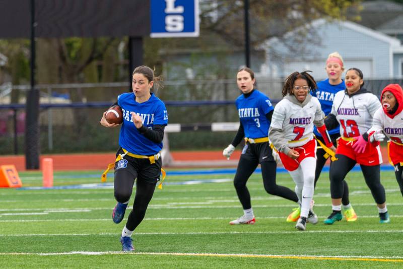 Anna Varland carry's the ball 60 yards on the opening drive.  Photo by Steve Ognibene