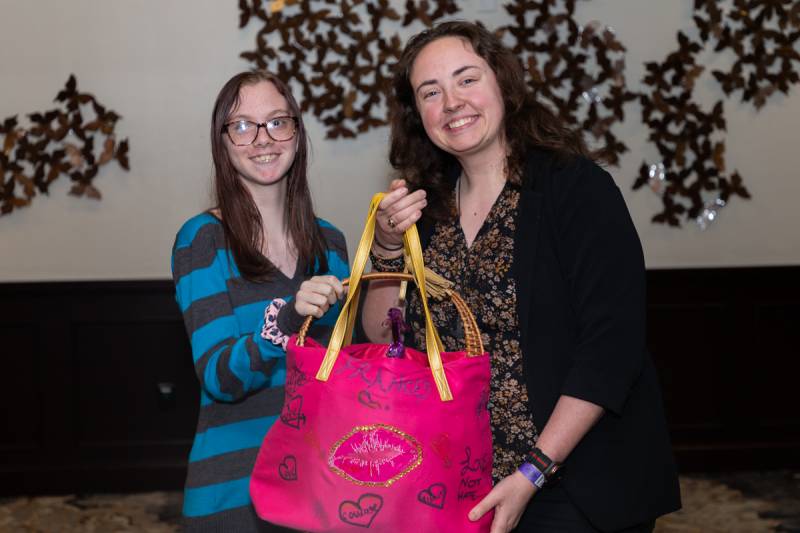 Samantha Rychlicki, Office Manager, announces the Frances's Purse Winner  Photo by Steve Ognibene 