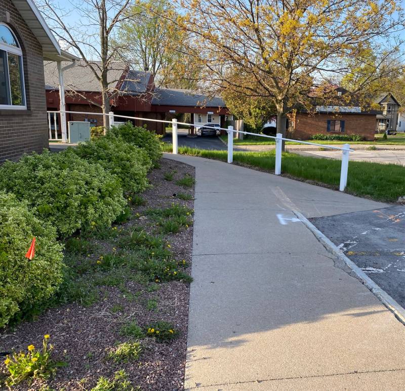 handicap sidewalk at Canzoneri