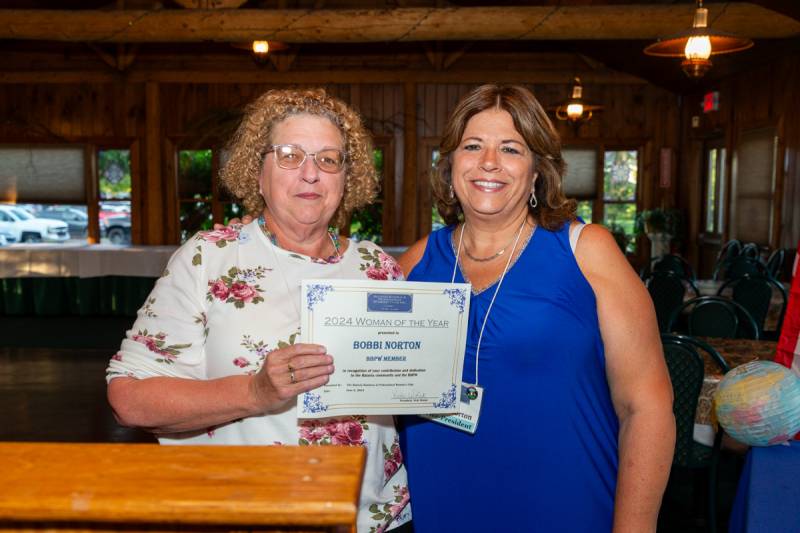 President Vicki Wolak recognized 2023 Woman of the Year Bobbi Norton.  Photo by Steve Ognibene