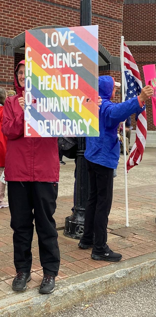 love sciene sign at protest