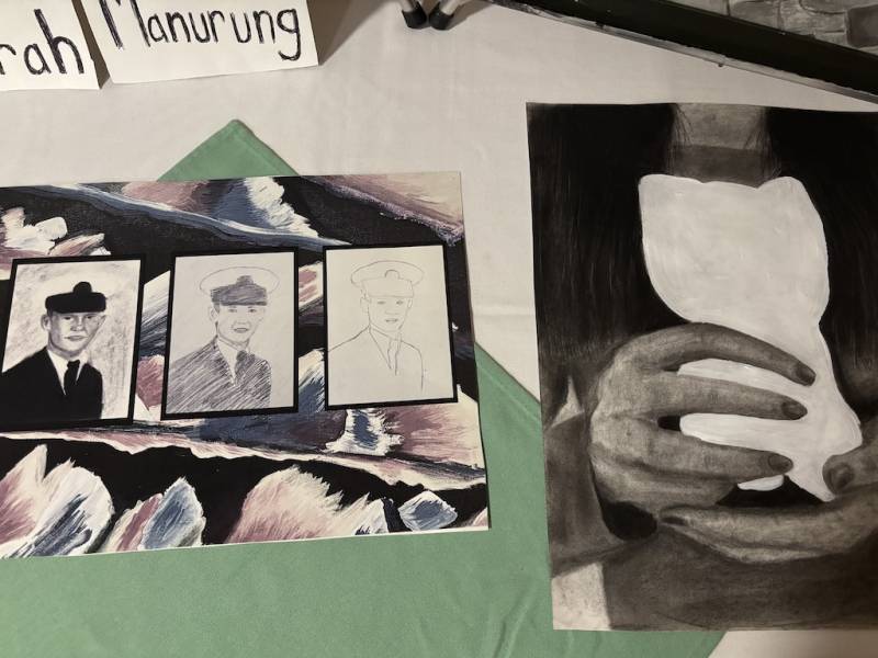 Some of Norah Manurung's artwork shows a man disapearing from a photo and a person holding something in their hands.